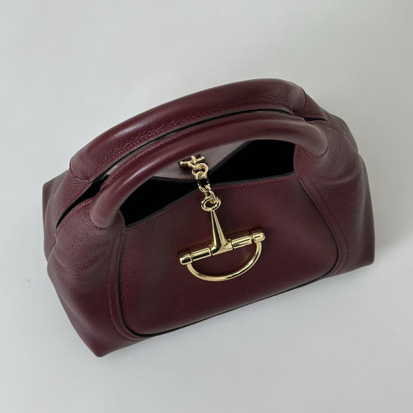 G*u*i softbit medium top handle bag